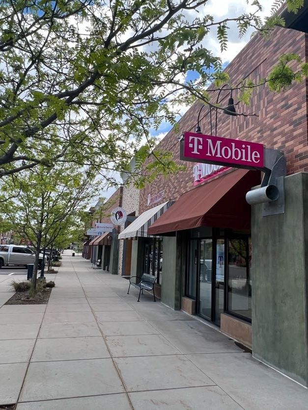 Shopfronts and street trees along the Bradburn Village core